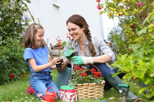 Gardener processing a secure online payment on a tablet for Walthamstow service